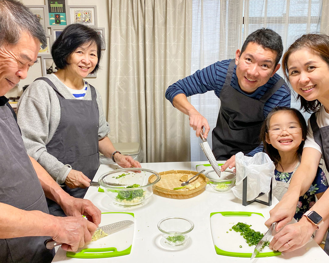 Homemade Japanese ramen and pan-fried gyoza prepared during an Osaka cooking class