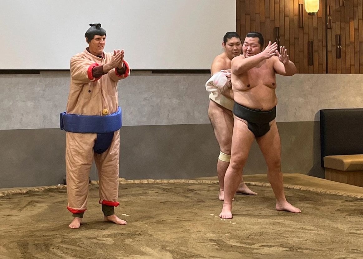 Sumo wrestlers presenting a live sumo experience in Tokyo
